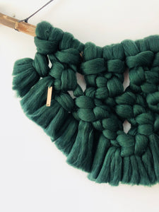 Noma macramé wandhanger lontwol.
